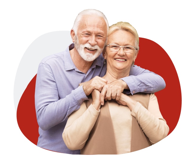 hombre y mujer de la tercera edad abrazados